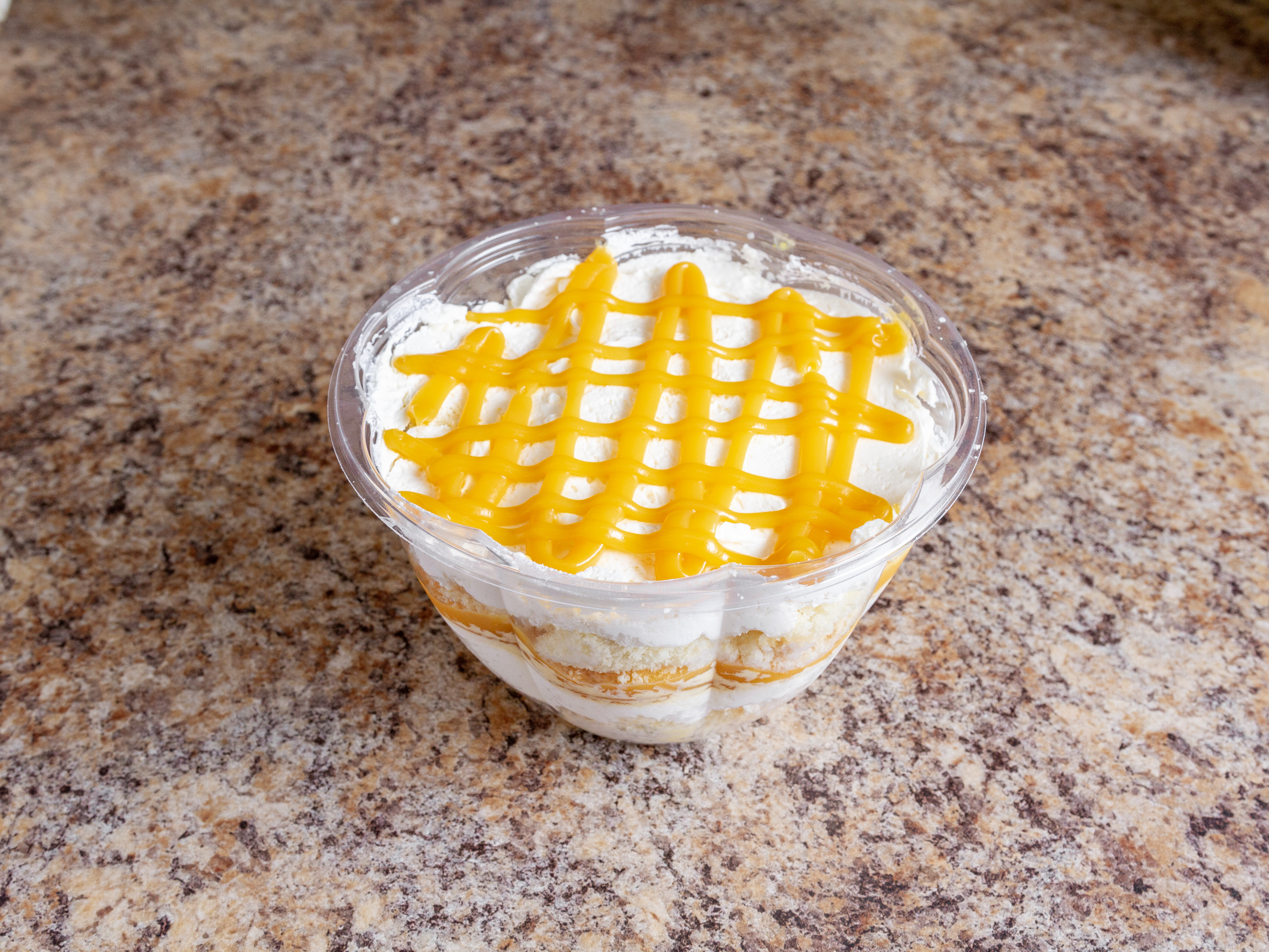 Order White Chocolate Mango Trifle food online from Pariser Bakery store, Baltimore on bringmethat.com