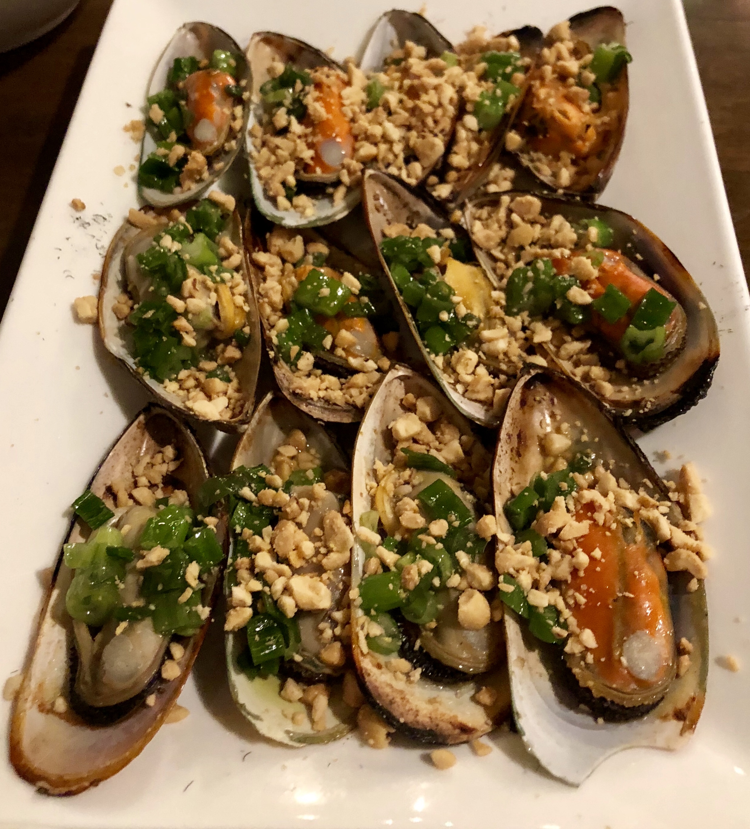 Order Grilled Green Mussels with Scallion & Crushed Peanut (12 con sò xanh nướng mỡ hành)   food online from Hello Saigon store, New York on bringmethat.com