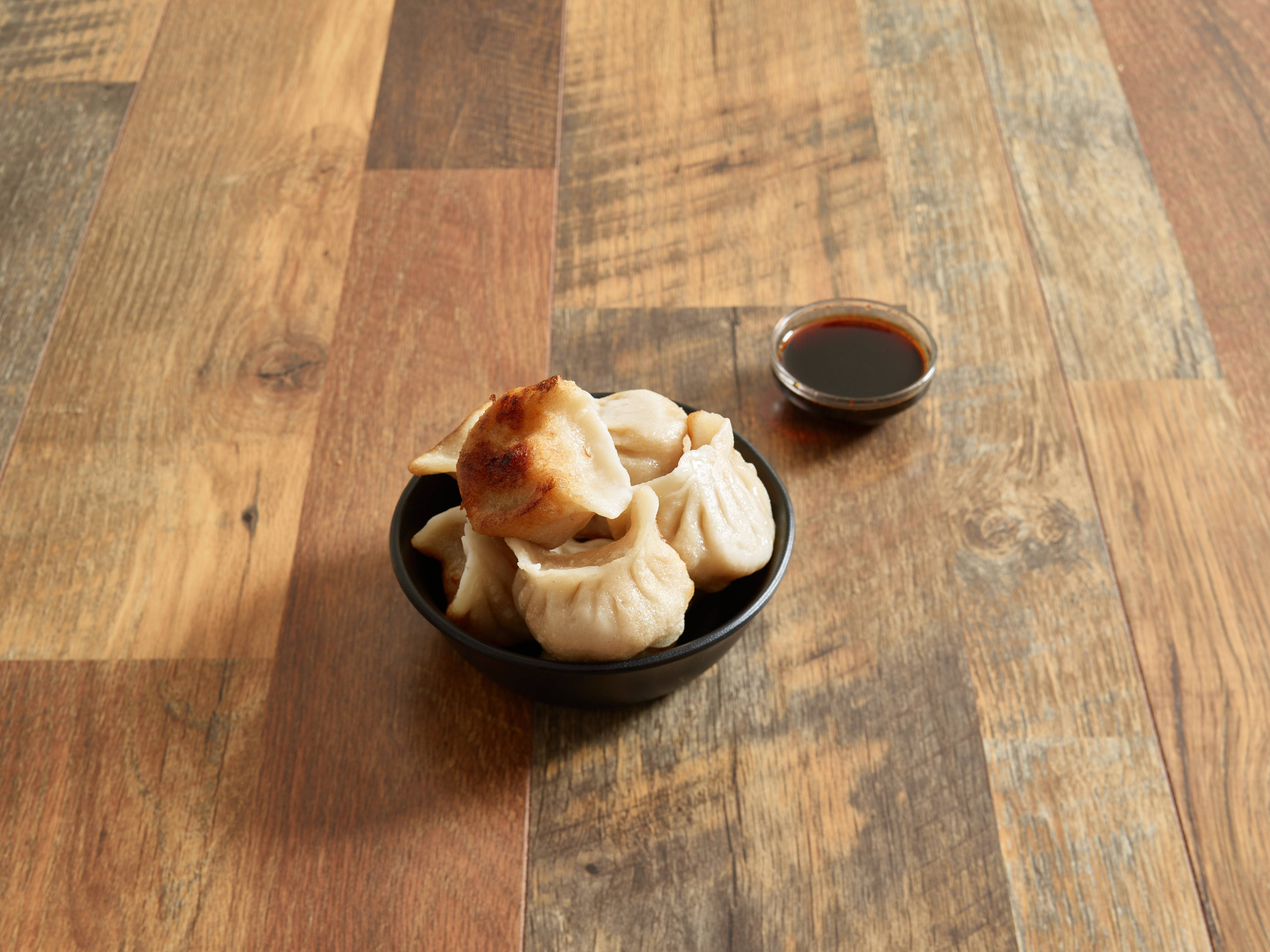 Order 9. Pan Fried Dumplings food online from China No.1 House Chinese Restaurant store, Kingston on bringmethat.com