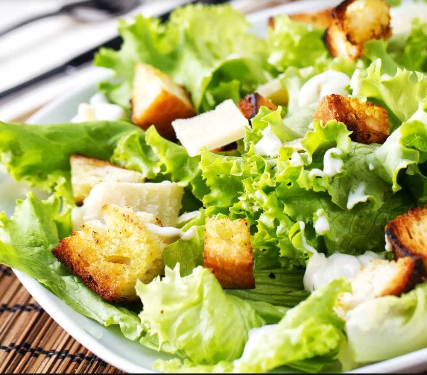 Order Caesar Salad Catering - Half Tray (8-12 People) food online from Lunetta pizza store, New York on bringmethat.com