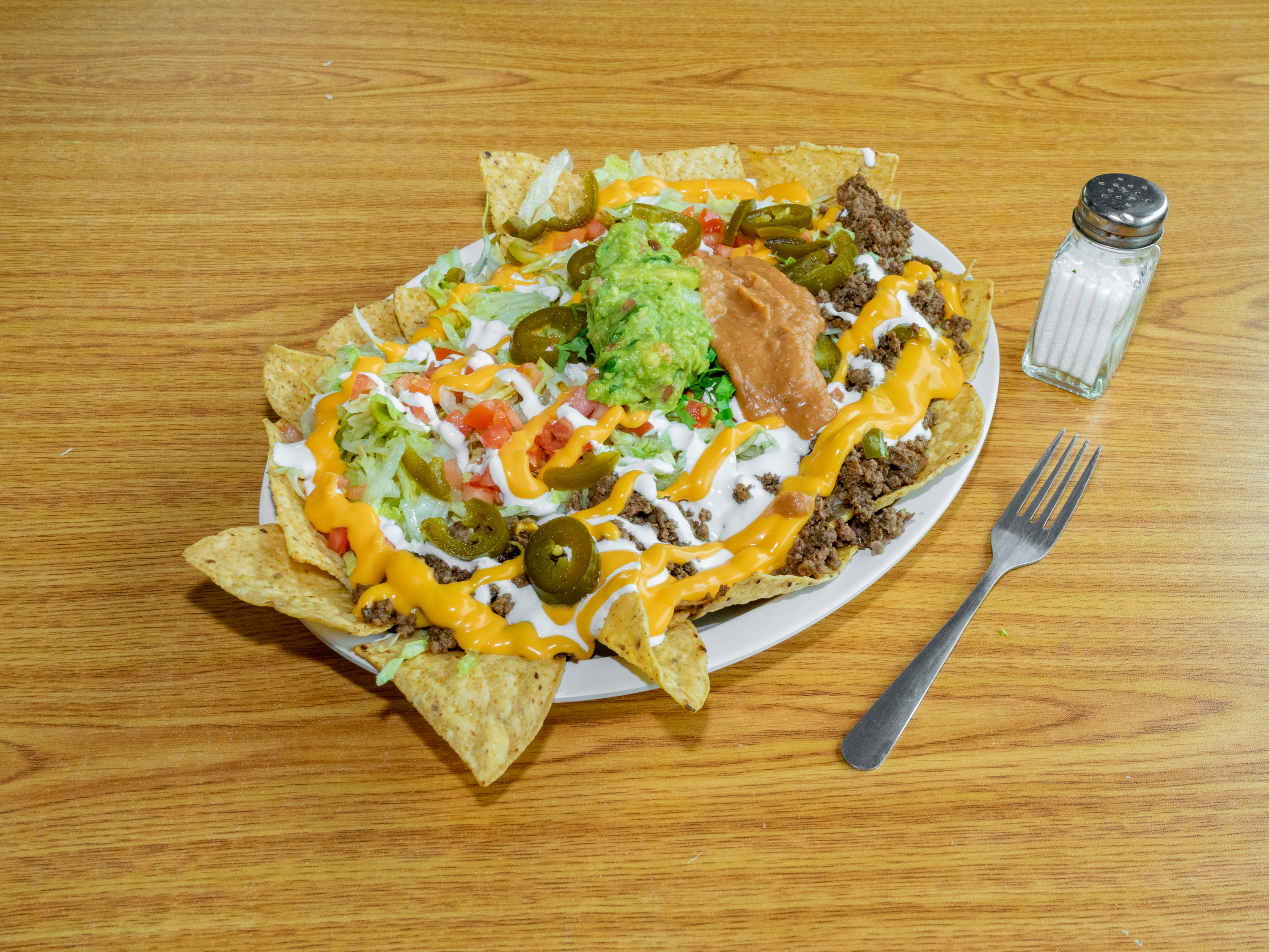 Order Nacho beef or chicken food online from Whata Taco Authentic Mexican Food store, Country Club Hills on bringmethat.com