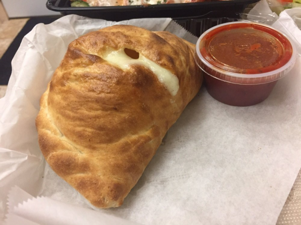 Order Meat Lover Calzone food online from Fratelli's Pizza store, North Hills on bringmethat.com