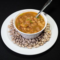 Order Charro Beans food online from Bigotes Street Tacos store, The Woodlands on bringmethat.com