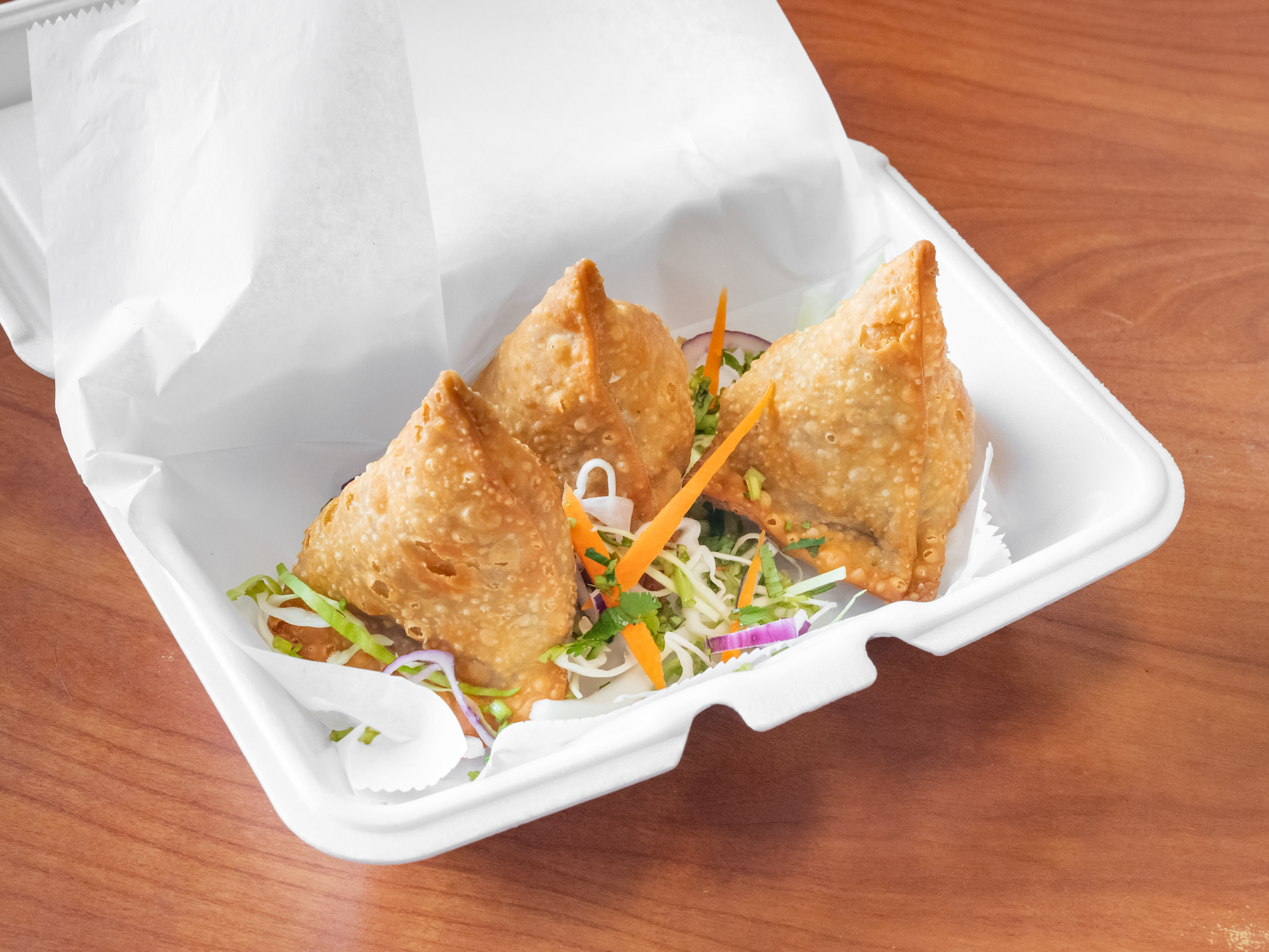 Order 1. Vegetable Samosa food online from Madina Indian Restaurant store, St. Clair Shores on bringmethat.com