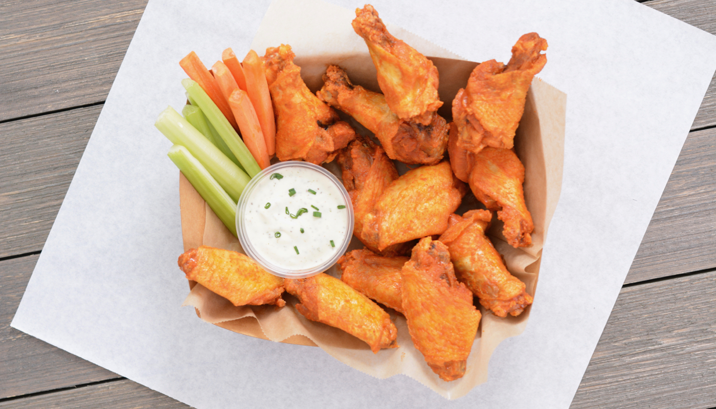 Order 12 Classic Bone-In Wings food online from Wildcard Wings store, Hutto on bringmethat.com