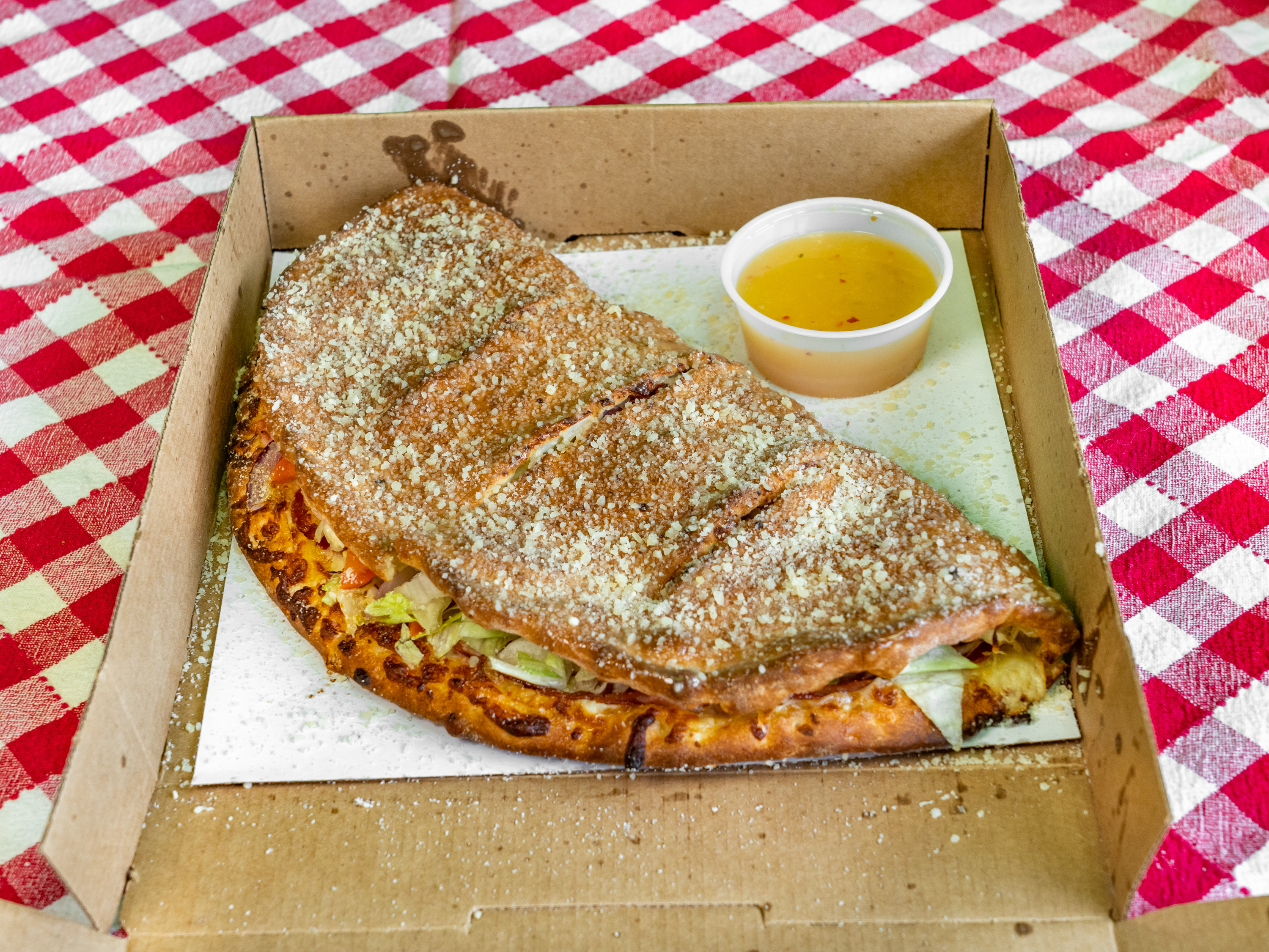 Order The Soprano Calzone food online from What Up Dough Pizzeria store, Utica on bringmethat.com