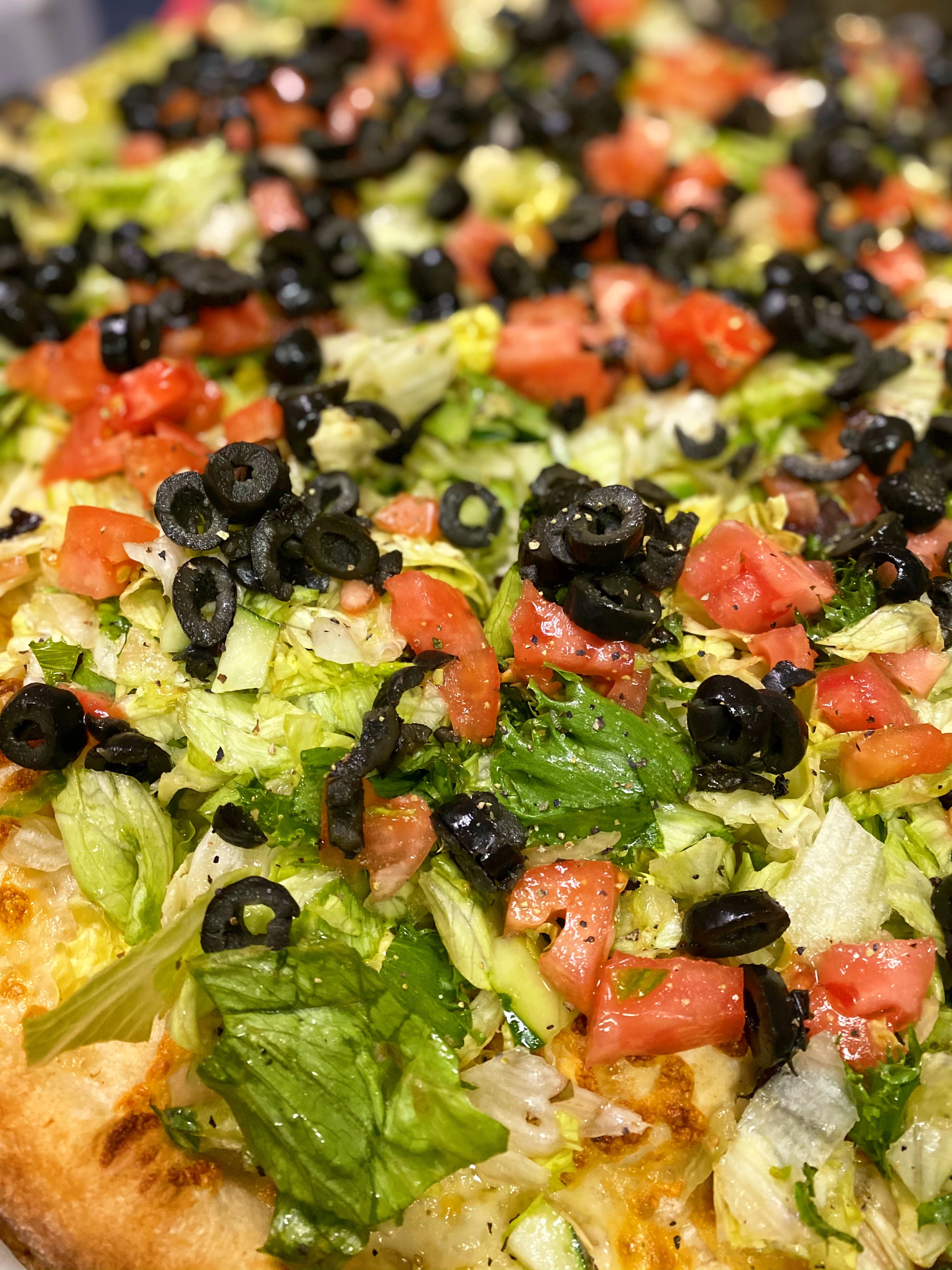 Order Salad - Large 18'' food online from Sergio's Pizzeria & Restaurant store, Glen Head on bringmethat.com