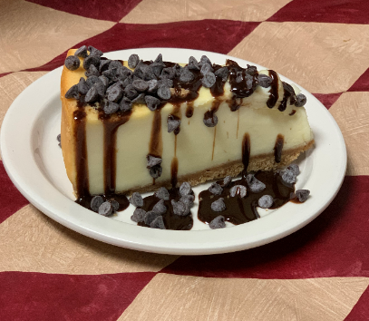 Order Cheesecake Drizzled with Chocolate and Mini-Morsels food online from Peluso's Italian store, Columbus on bringmethat.com