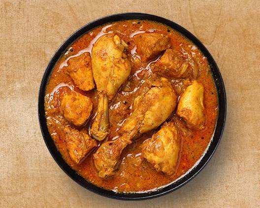 Order Classic Chicken Curry food online from Curry Consortium store, Topeka on bringmethat.com