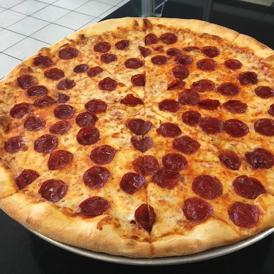 Order One Large Pizza with One Topping Monday - Thursday Special - Special food online from Douglass Pizza & Grill store, Franklin Park on bringmethat.com