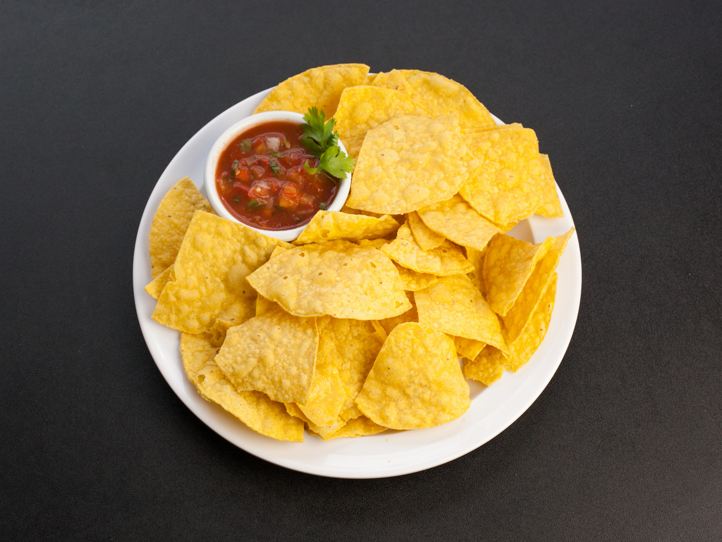 Order Side of Chips and Sauce food online from Tacos Guaymas store, Seattle on bringmethat.com
