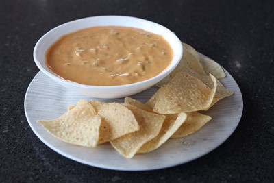 Order Chile con Queso food online from Tumbleweed Southwest Grill store, Heath on bringmethat.com