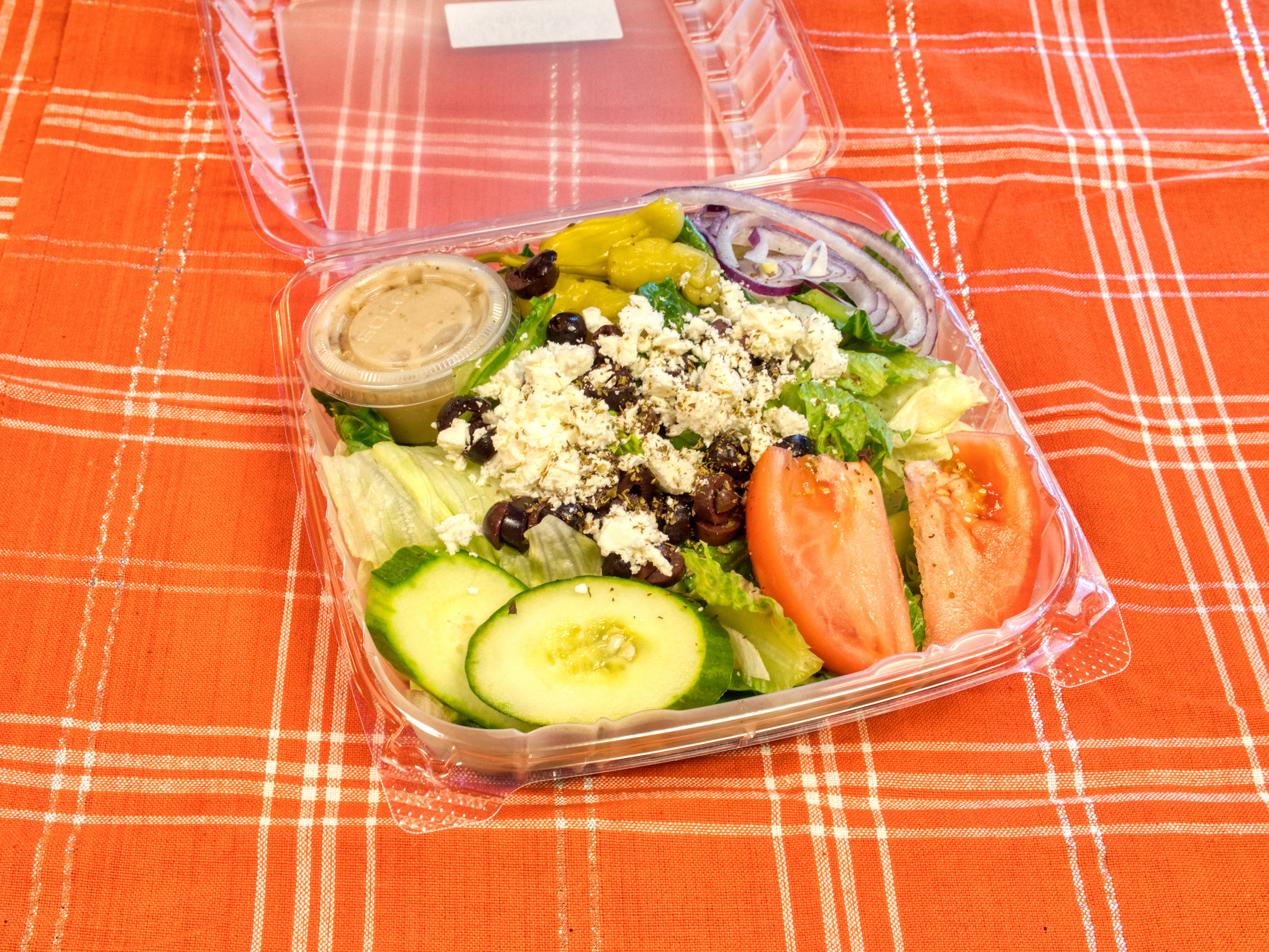 Order The Greek Salad food online from Nicko Cafe & Deli store, Oakbrook Terrace on bringmethat.com