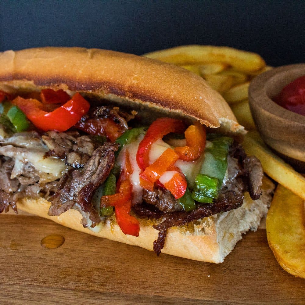 Order Philly Cheese Steak Sub Lunch - 6'' food online from Cucina Italiana store, Dania Beach on bringmethat.com