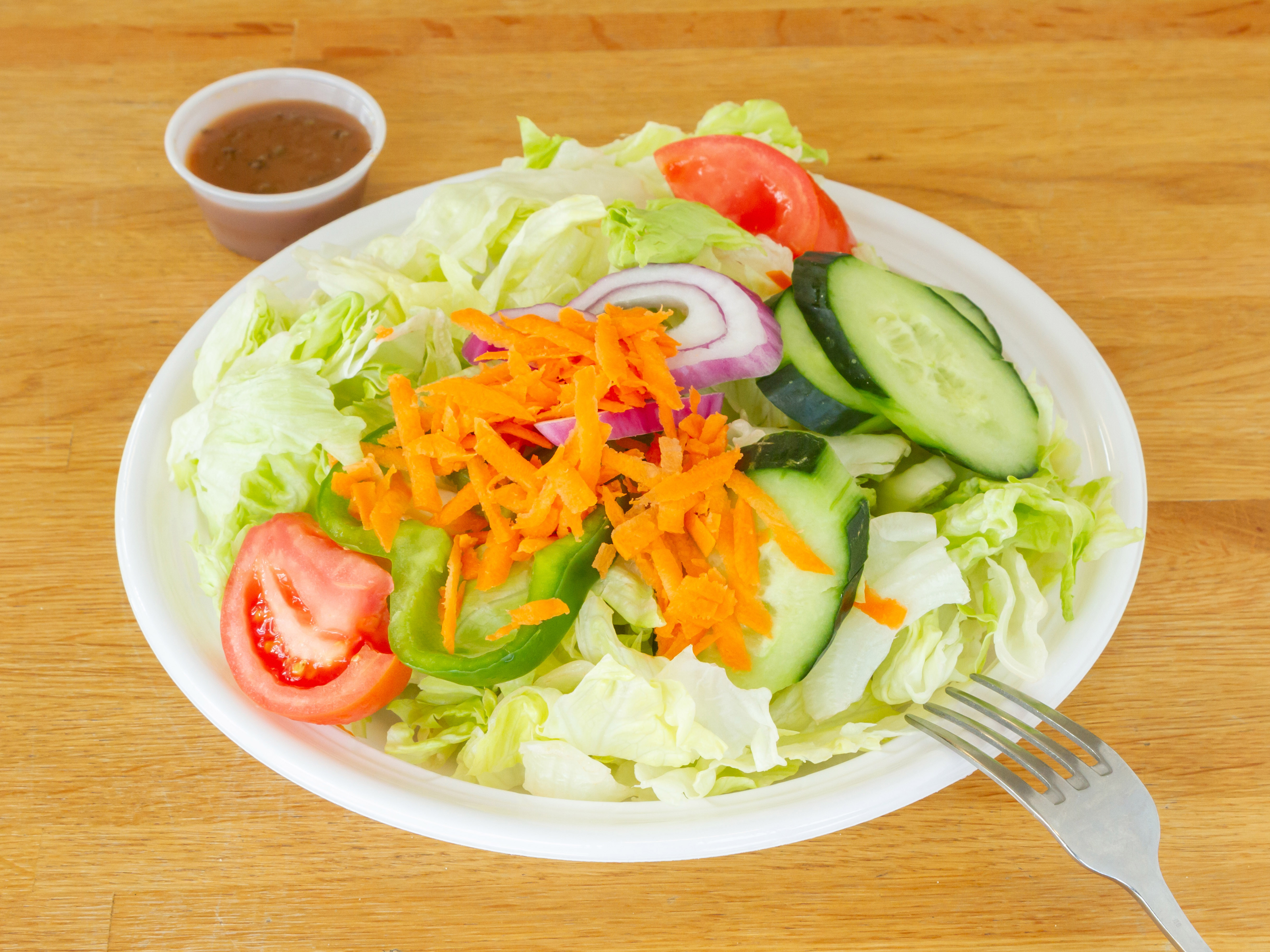 Order Garden Salad food online from Lisa’s Family Pizzeria store, Belmont on bringmethat.com