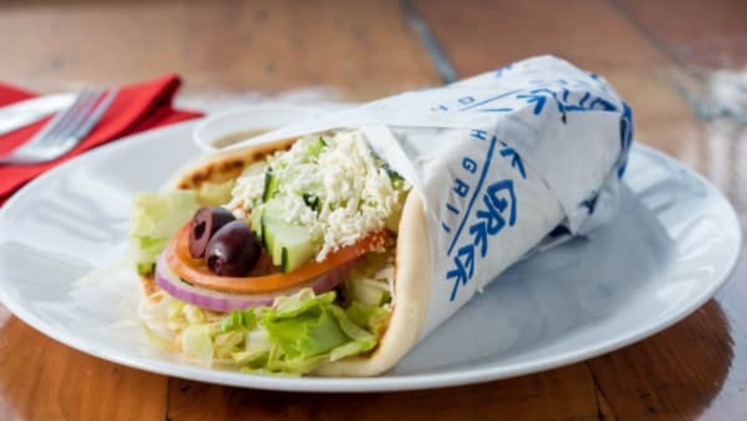 Order VEGGIE PITA food online from Little Greek Fresh Grill store, Youngstown on bringmethat.com
