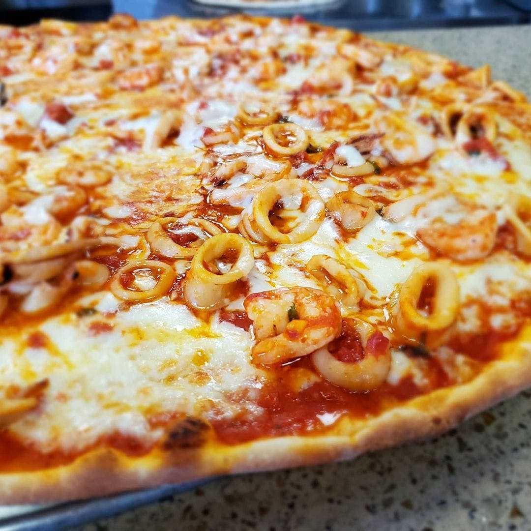 Order Calamari Marinara Pizza - Small 14'' food online from Midland Ave Pizzeria store, Yonkers on bringmethat.com