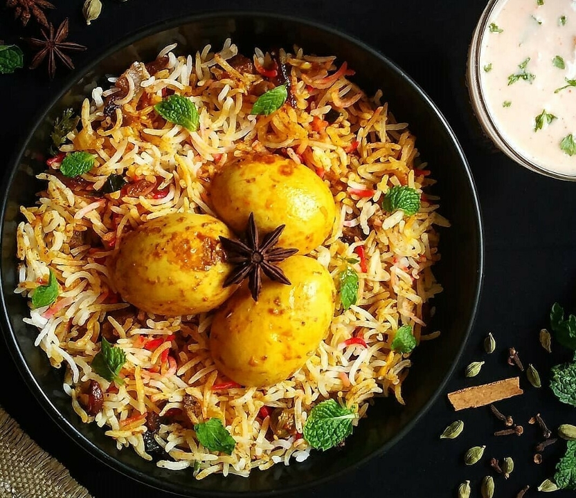 Order Egg Biryani food online from Peacock Indian Cuisine store, Plano on bringmethat.com