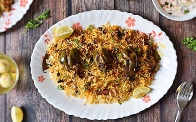 Order Gutti Vankaya Biryani food online from Peacock Indian Cuisine store, Plano on bringmethat.com