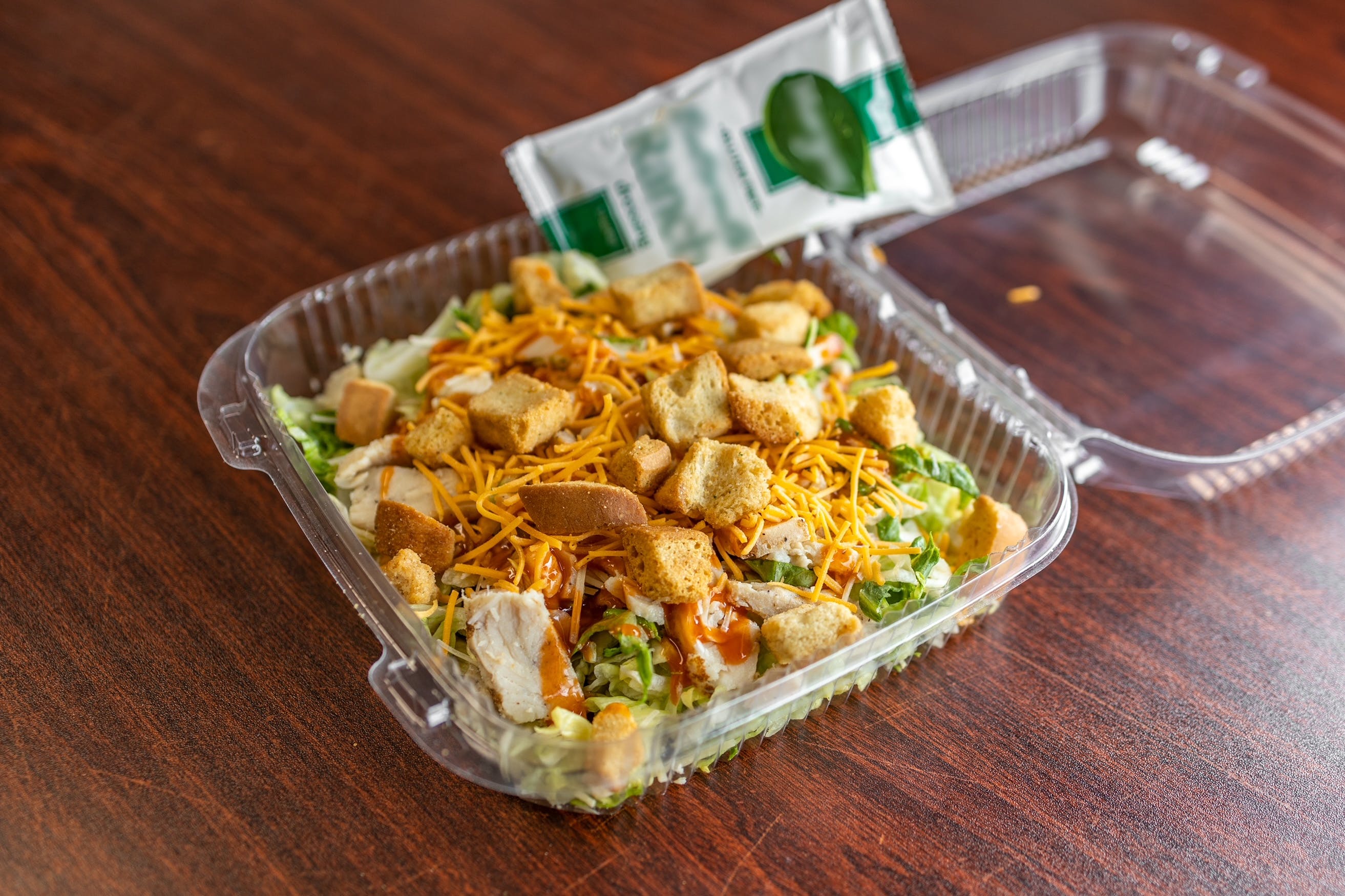 Order BBQ  Chicken Salad - Salad food online from Jimmy's Pizza Litchfield store, Litchfield on bringmethat.com