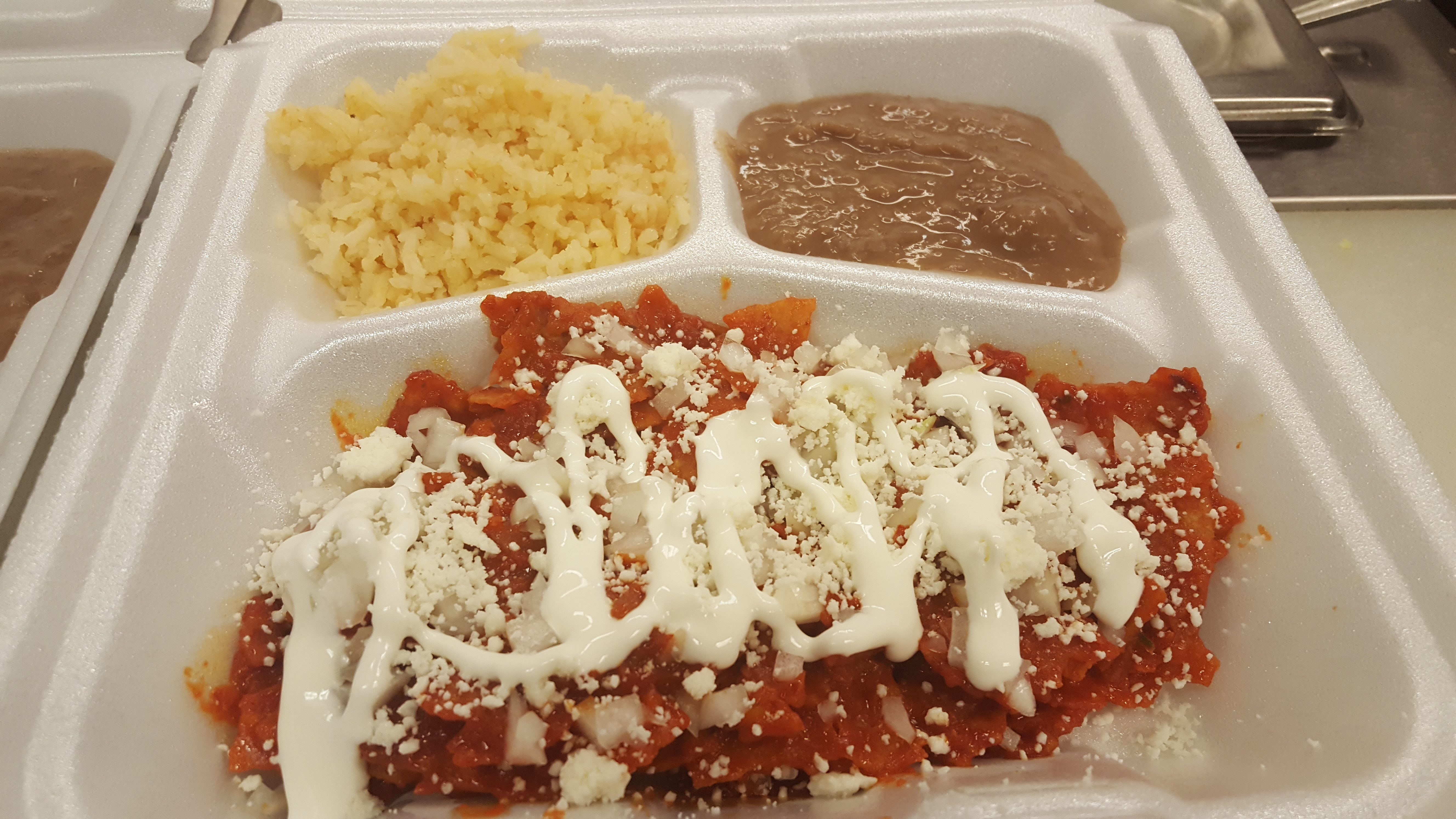 Order Chilaquiles Rojos O Verdes food online from Chilangos Authentic Mexican Cuisine store, Rockford on bringmethat.com