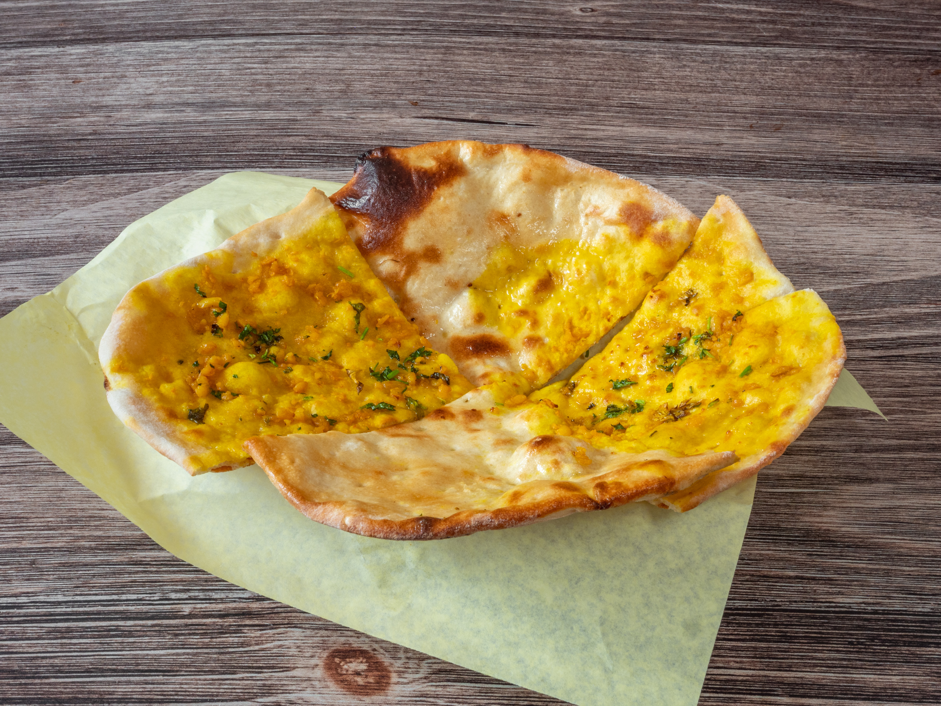 Order Naan food online from Golden Gate Pizza & Indian Cuisine store, San Francisco on bringmethat.com