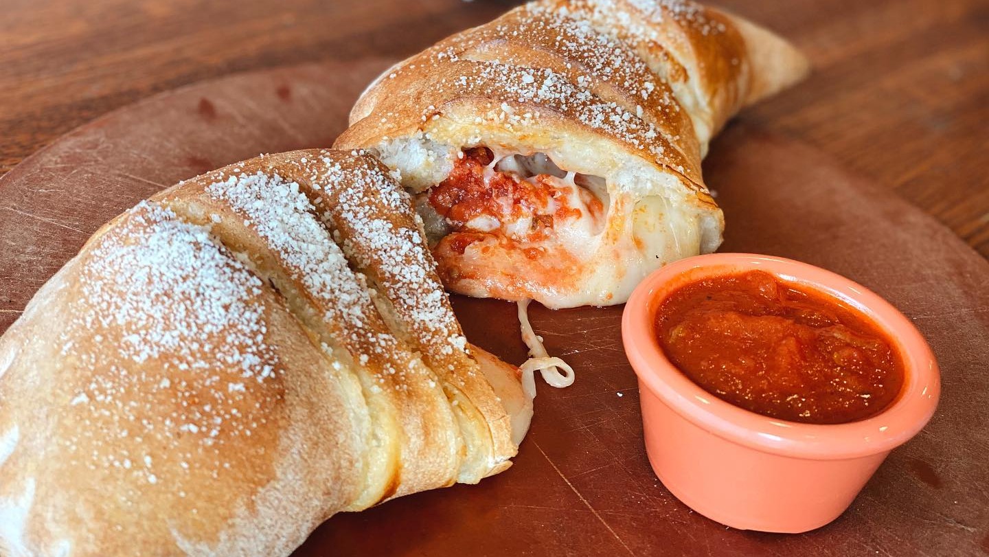 Order Chicken Portobello Calzone food online from Angelico Pizzeria and Cafe store, Washington on bringmethat.com