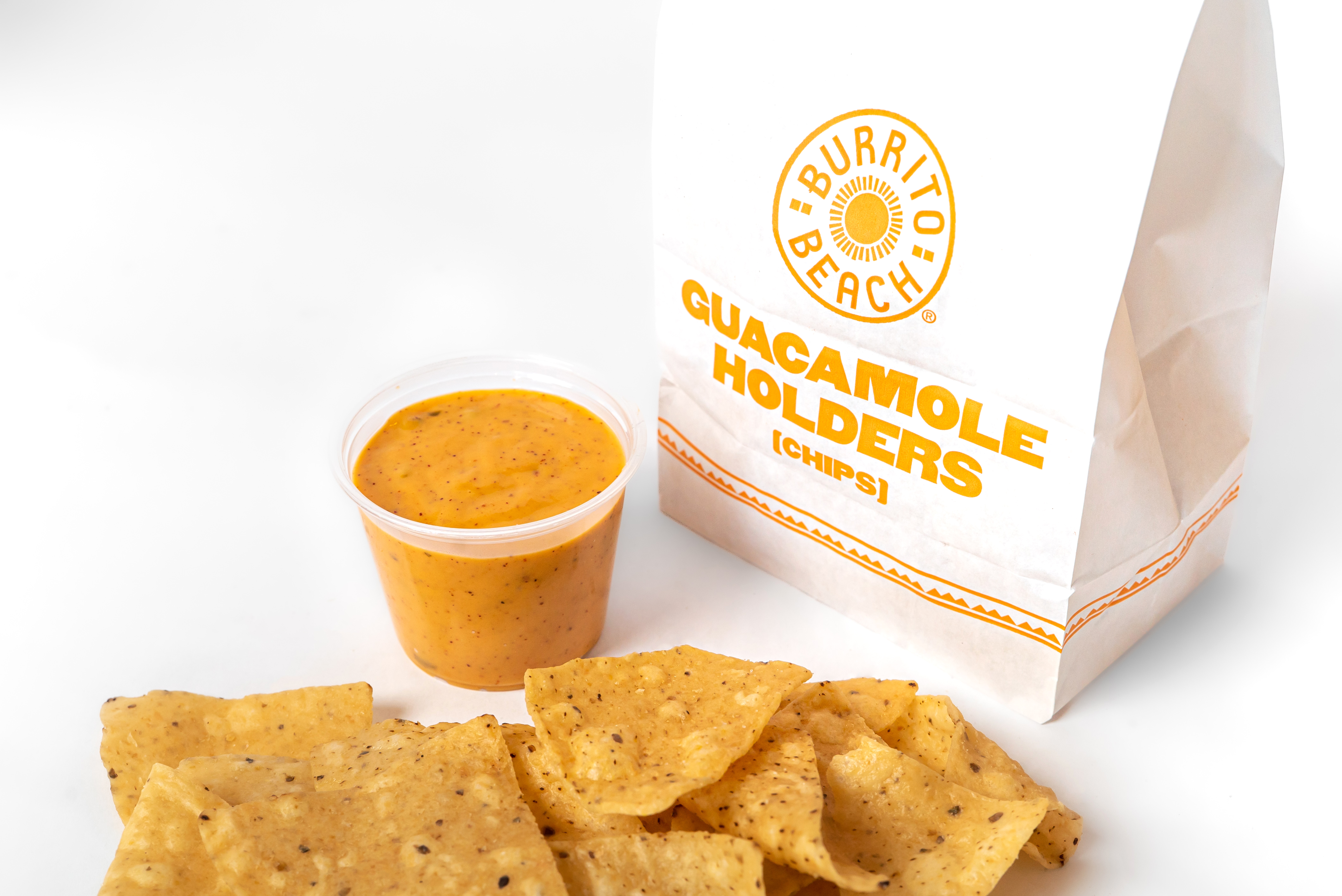 Order CHIPS & RED CHILE QUESO - LARGE food online from Burrito Beach store, Chicago on bringmethat.com