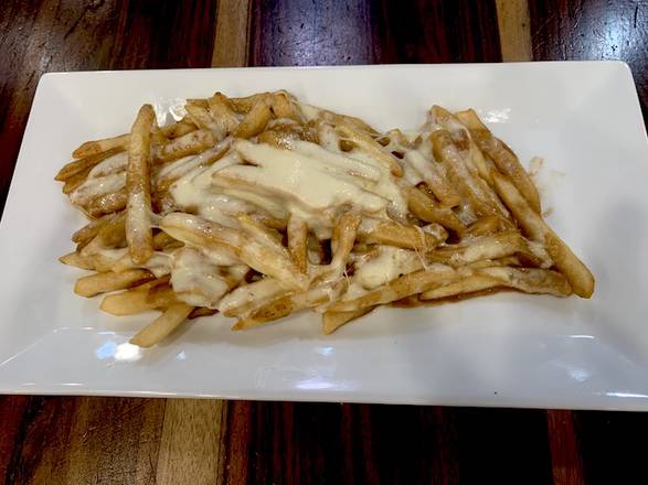 Order Disco Fries food online from Silver Spoon Diner store, New York on bringmethat.com