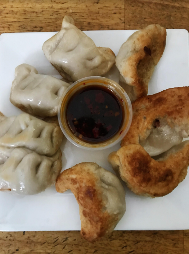 Order 15. 8 Piece Fried Dumplings food online from Faith Chinese Food store, Brooklyn on bringmethat.com