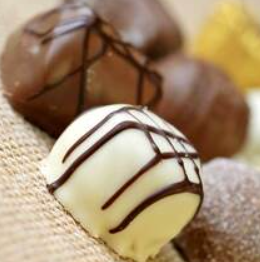 Order White Chocolate Truffle-12 Ounces food online from Distant Lands Coffee store, Tyler on bringmethat.com