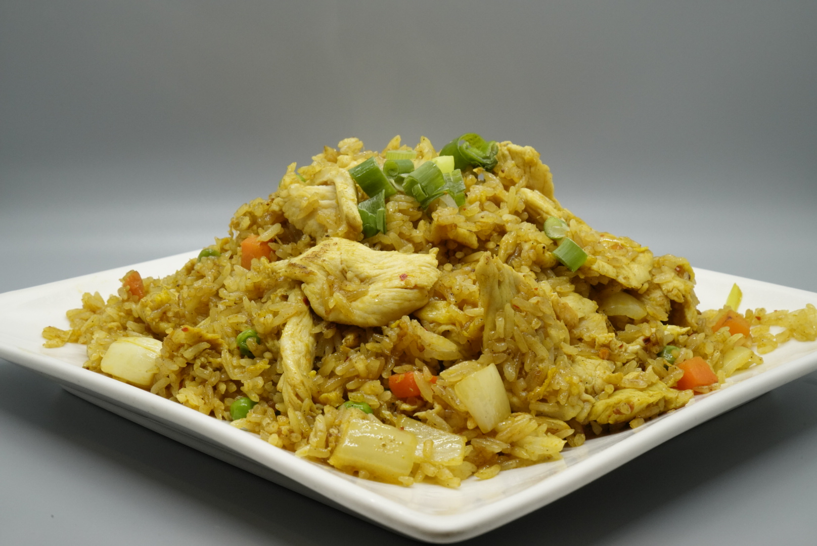 Order 64. Curry Fried Rice food online from Royal Orchid Thai II store, Riverside on bringmethat.com