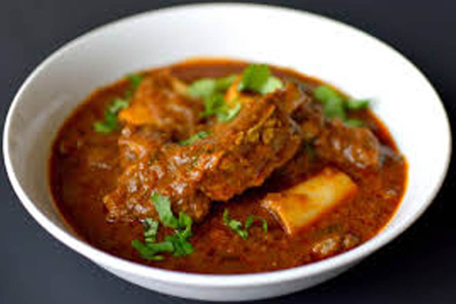 Order Goat Curry food online from Priya Indian Cuisine store, Lowell on bringmethat.com