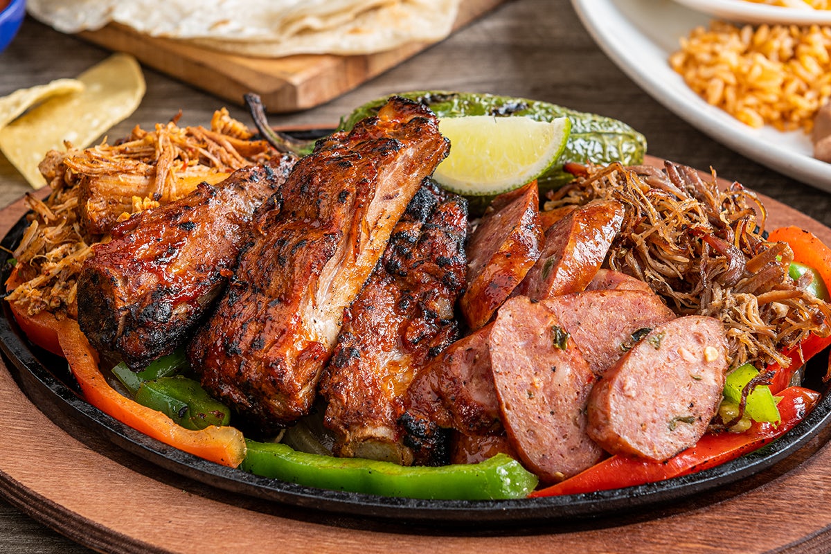 Order Smokehouse Fajitas food online from On The Border store, Garland on bringmethat.com