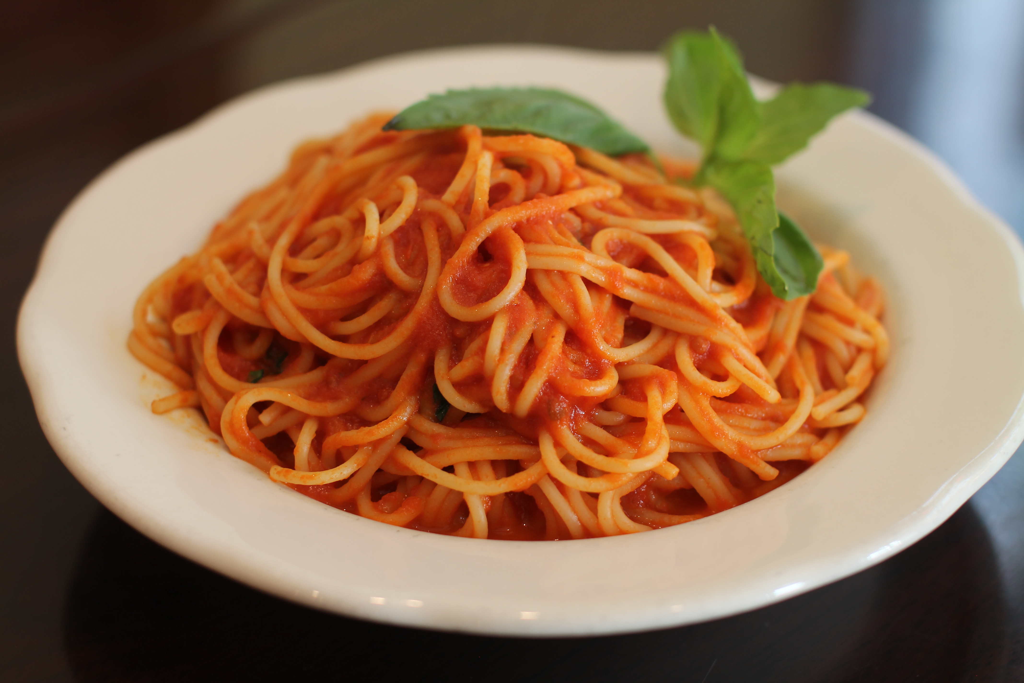 Order 1. Spaghettini alla Pomodoro food online from Pomodoro ristorante store, New York on bringmethat.com