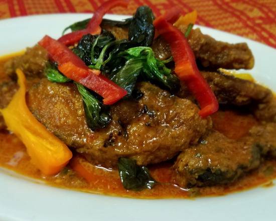 Order Fried Catfish Sauteed with Red Curry food online from Indra Restaurant store, Glendale on bringmethat.com