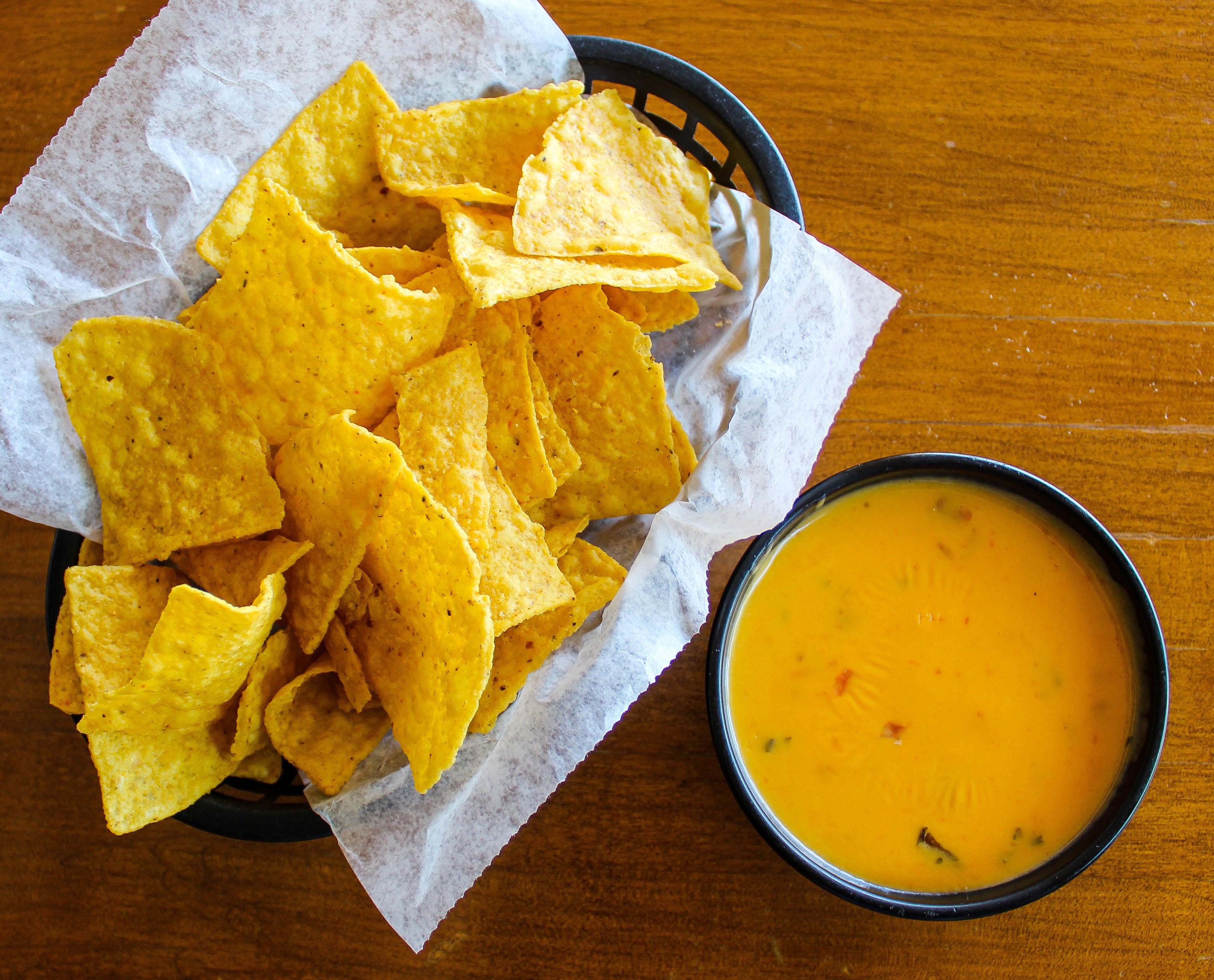 Order Chile con Queso food online from Las Palomas store, Austin on bringmethat.com