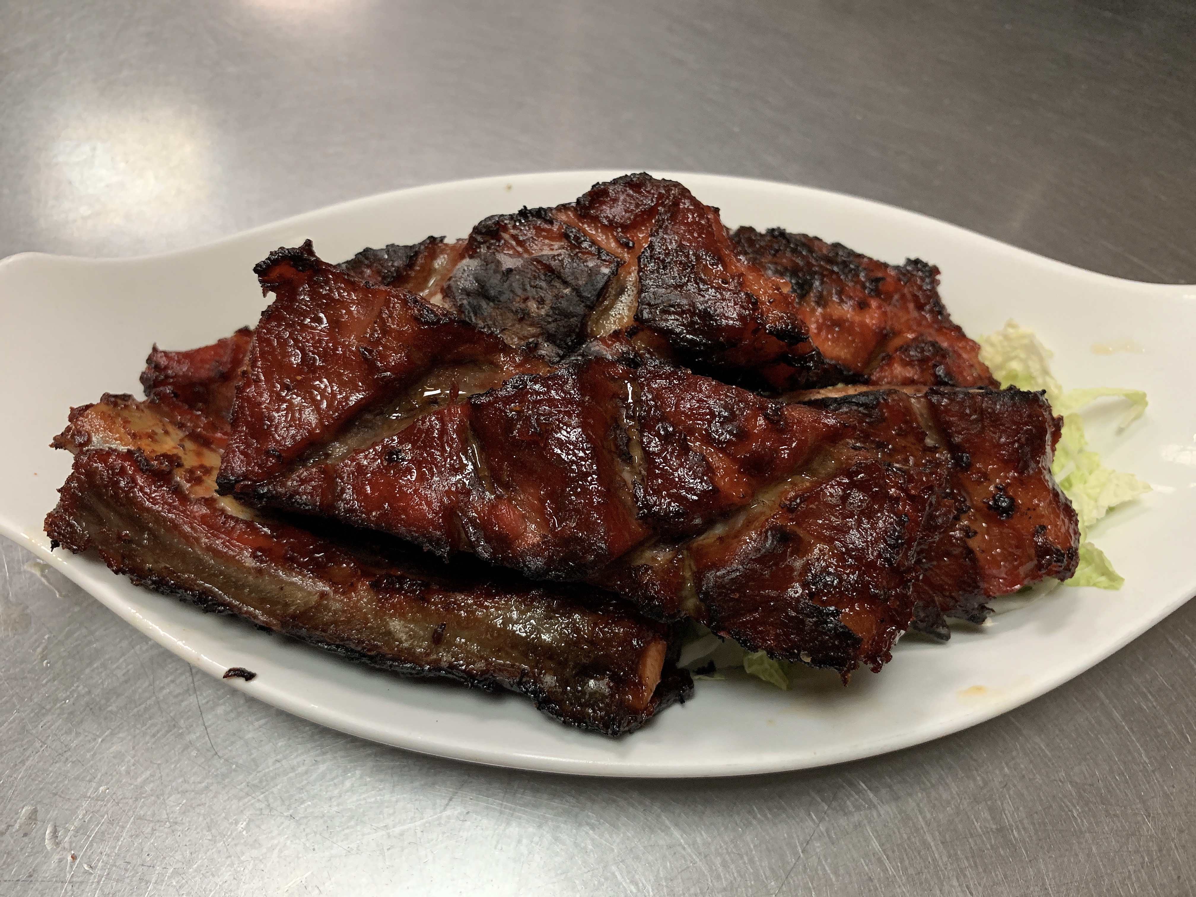 Order 17. BBQ Spare Ribs food online from Happy Garden store, Williston Park on bringmethat.com
