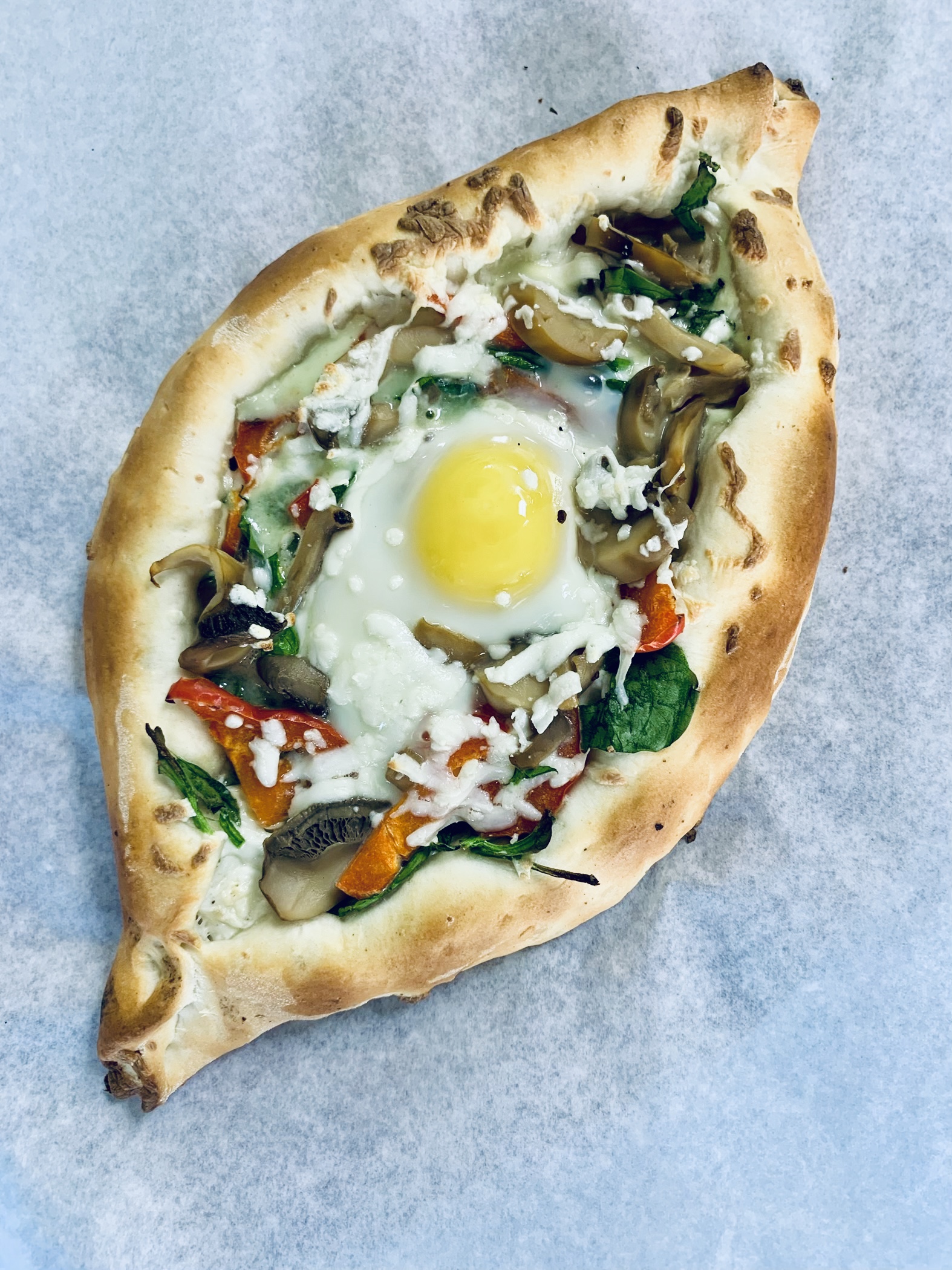 Order one egg Khachapuri with vegetables and cheese  food online from Zaatar Factory Bakery store, Burbank on bringmethat.com