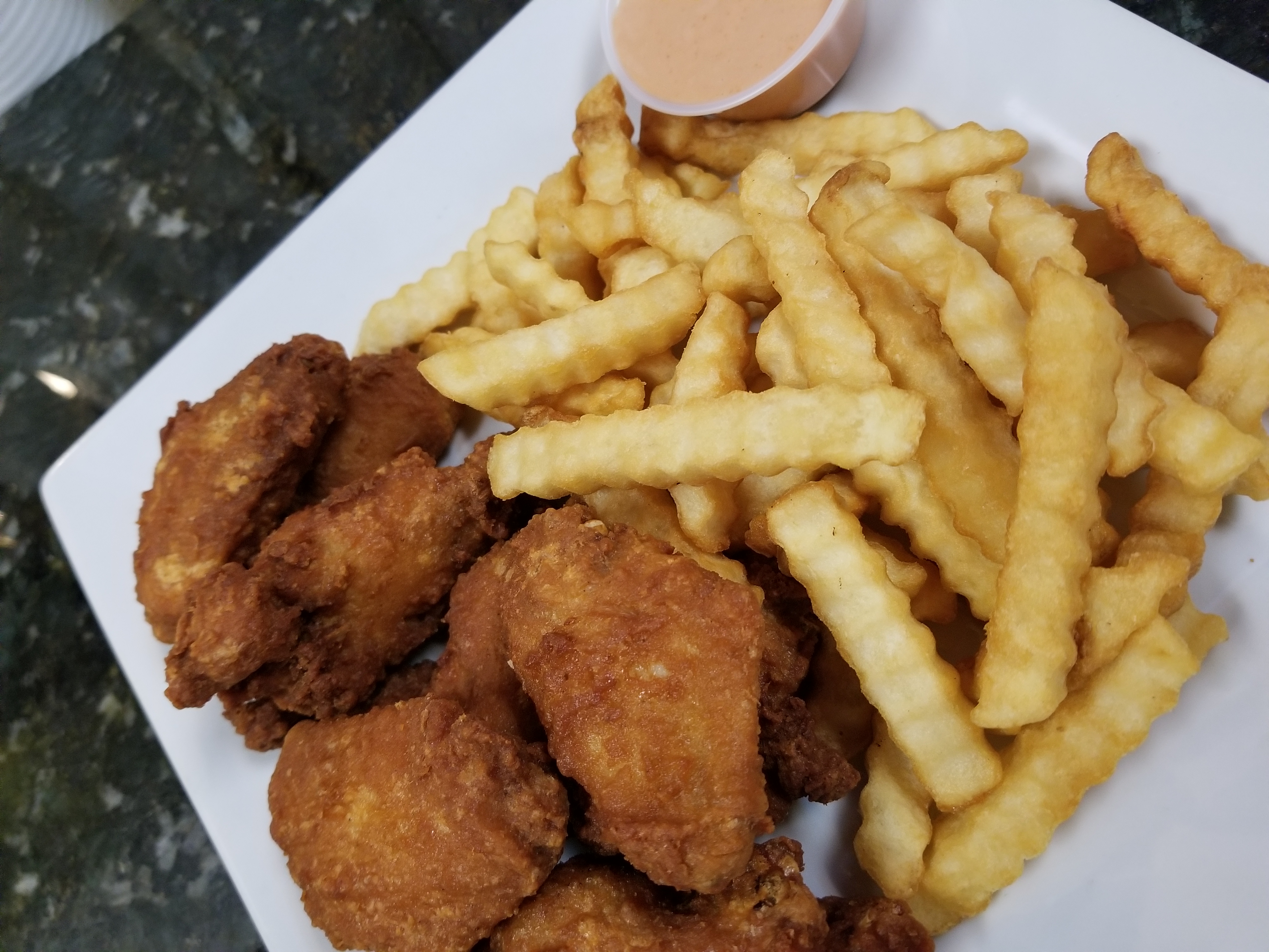 Order Traditional 10 Piece Wings food online from Aqua Lounge store, Warner Robins on bringmethat.com