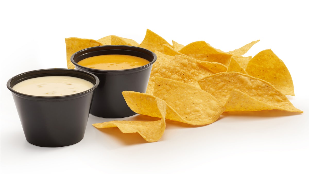 Order Dueling Queso & Chips food online from Tijuana Flats store, Valrico on bringmethat.com