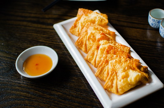 Order Crab Rangoon [4] food online from Chinese Kitchen Sushi store, Chicago on bringmethat.com