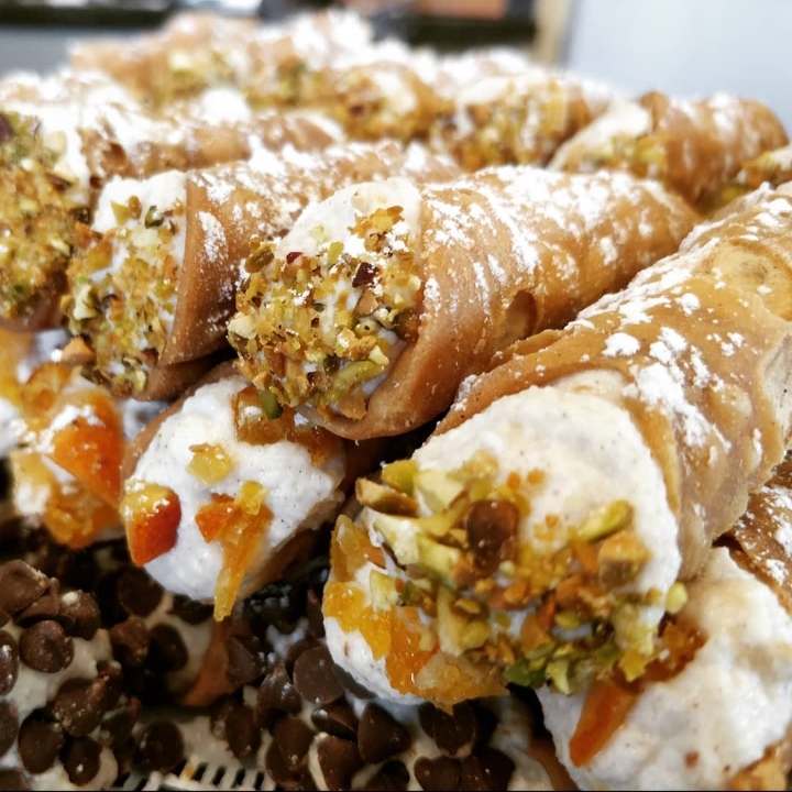 Order Pistachio Cannoli food online from Amighetti's Bakery & Cafe store, Rock Hill on bringmethat.com