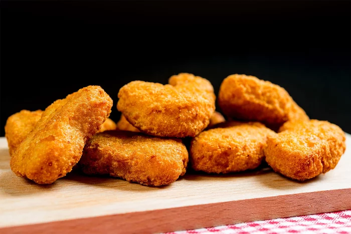 Order 鸡粒 Chicken Nuggets（10） food online from New China store, Catasauqua on bringmethat.com