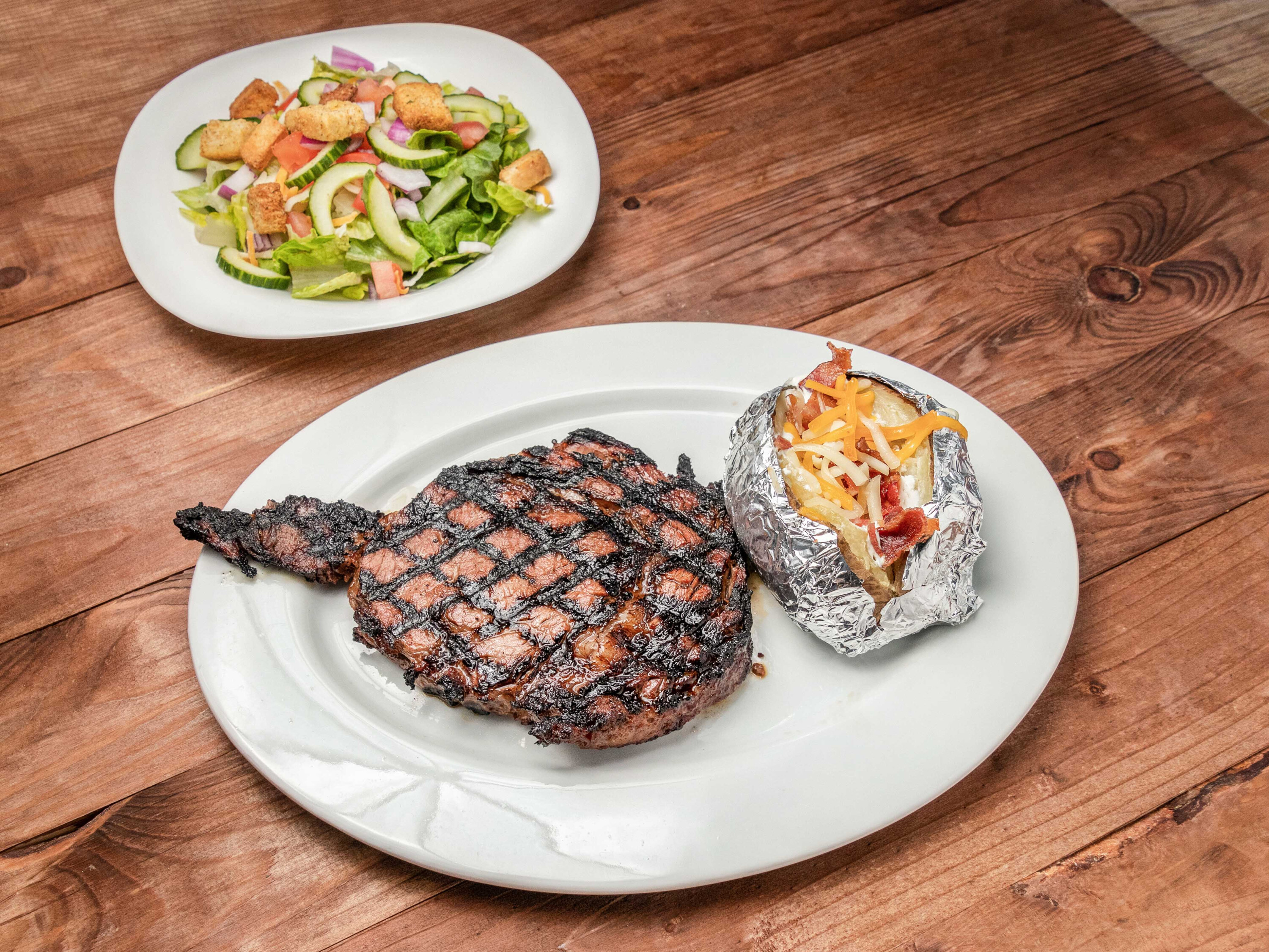 Order 12 oz. Ribeye Steak food online from Brimstone Restaurant & Tavern store, Alpharetta on bringmethat.com