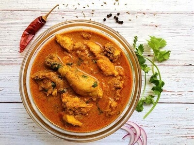Order Chettinadu Chicken Curry food online from Peacock Indian Cuisine store, Plano on bringmethat.com