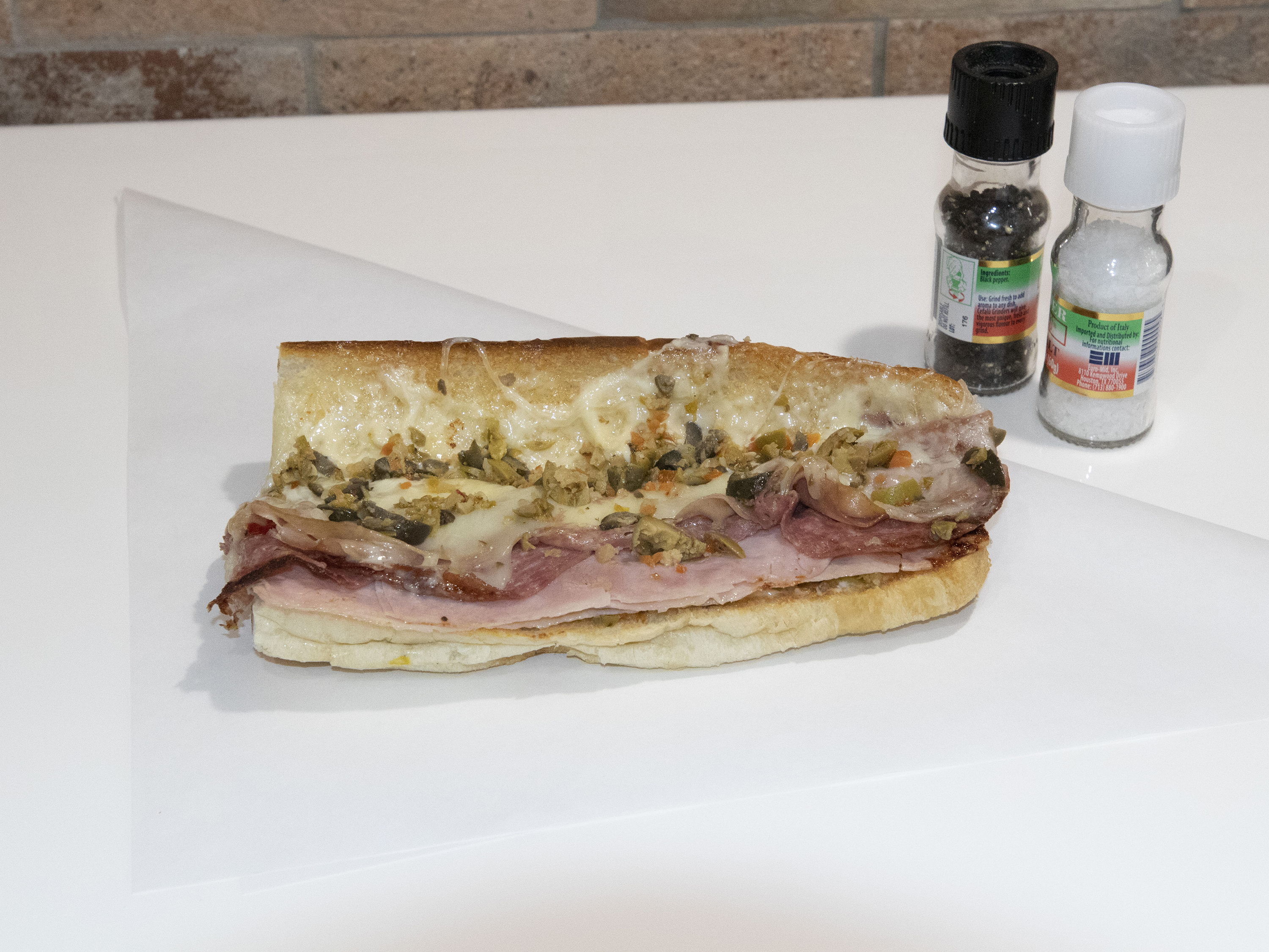 Order POBOY MUFFALETTA food online from Paulies Poboys store, Houston on bringmethat.com