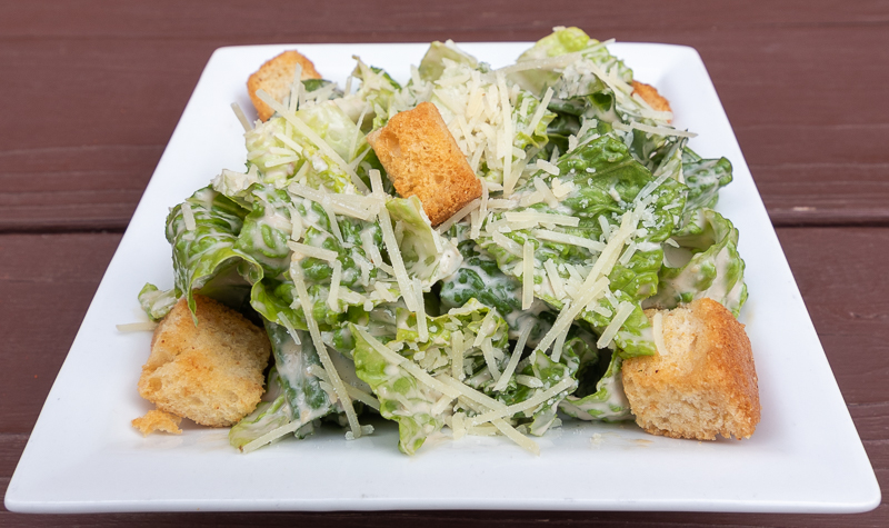 Order Caesar Salad food online from TumbleWings store, Durham on bringmethat.com