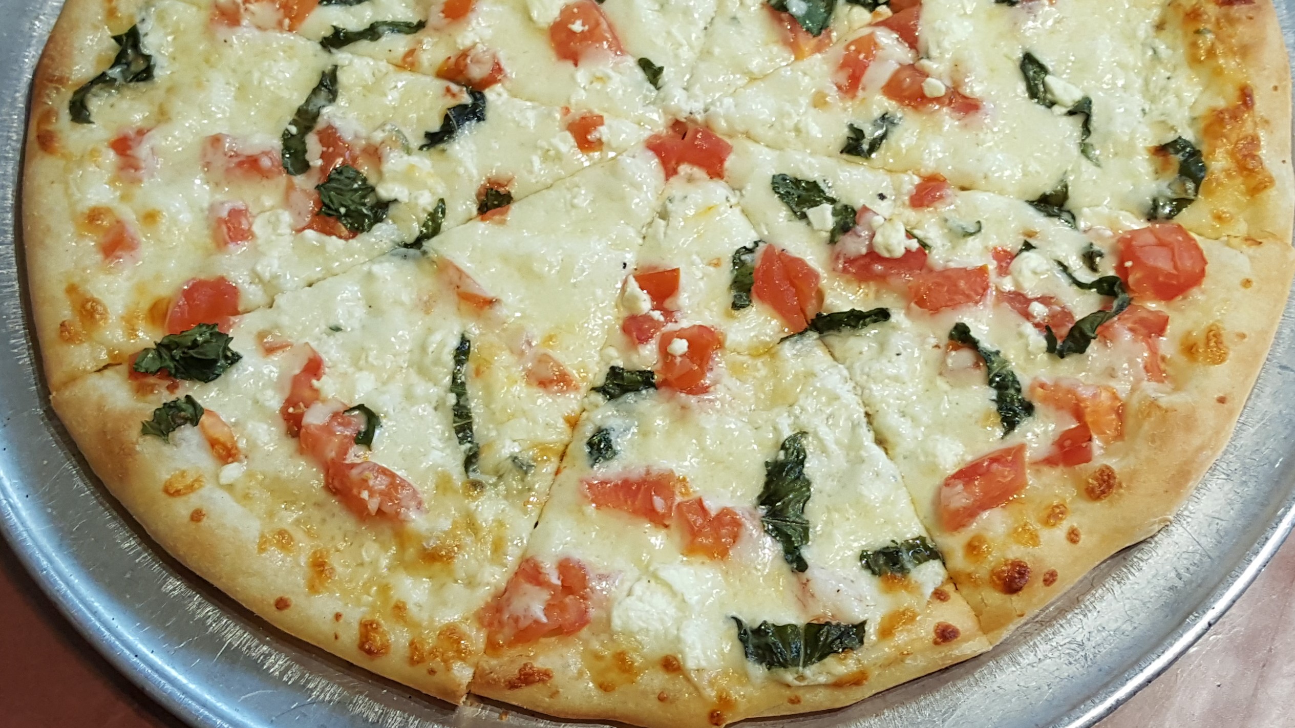 Order Quattro Formaggio Specialty Pizza food online from Primo Pizza & Pasta store, Carlsbad on bringmethat.com