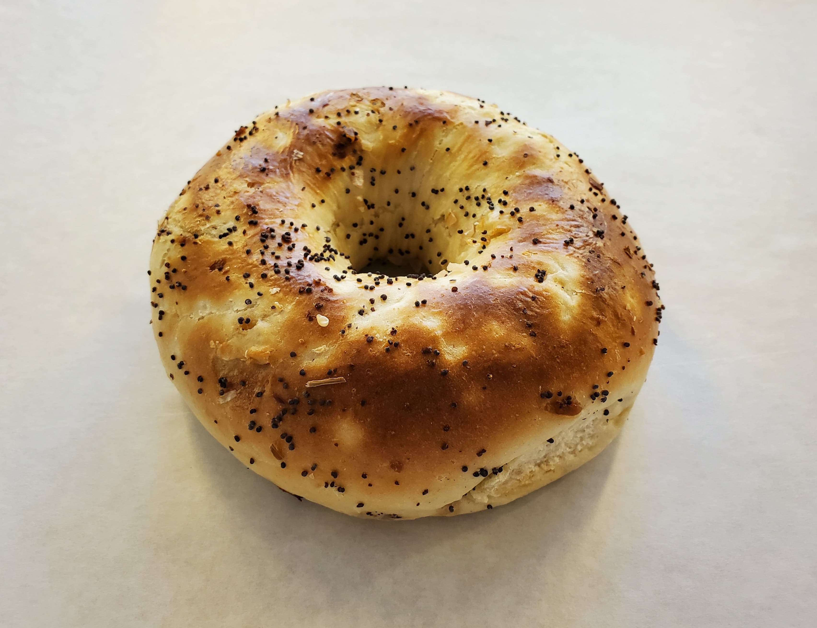 Order Onion Bagel toasted cream cheese food online from Honey Donuts store, Crowley on bringmethat.com
